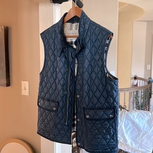 Men’s large Burberry Brit quilted navy vest.
